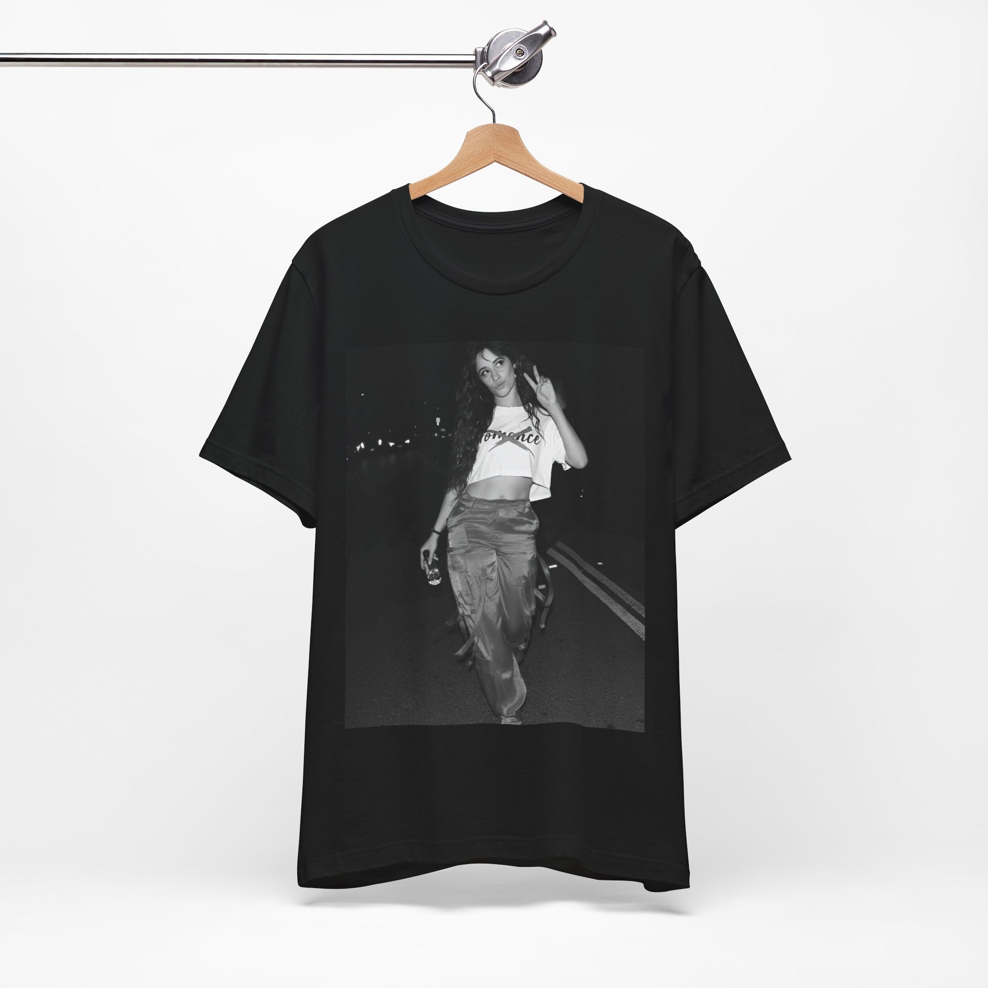 A black graphic t-shirt featuring a photo of Camila Cabello from her "Romance" album era.