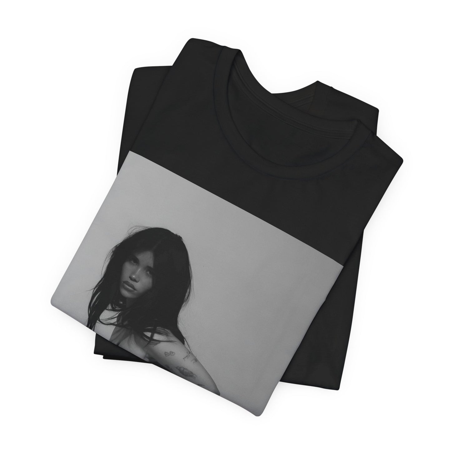 A black graphic t-shirt featuring a black and white, monochrome graphic or photo of Nessa Barrett.