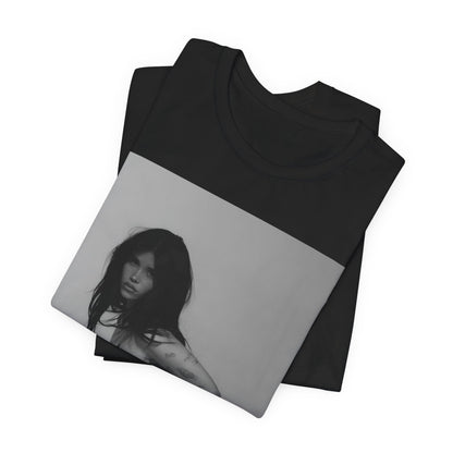 A black graphic t-shirt featuring a black and white, monochrome graphic or photo of Nessa Barrett.