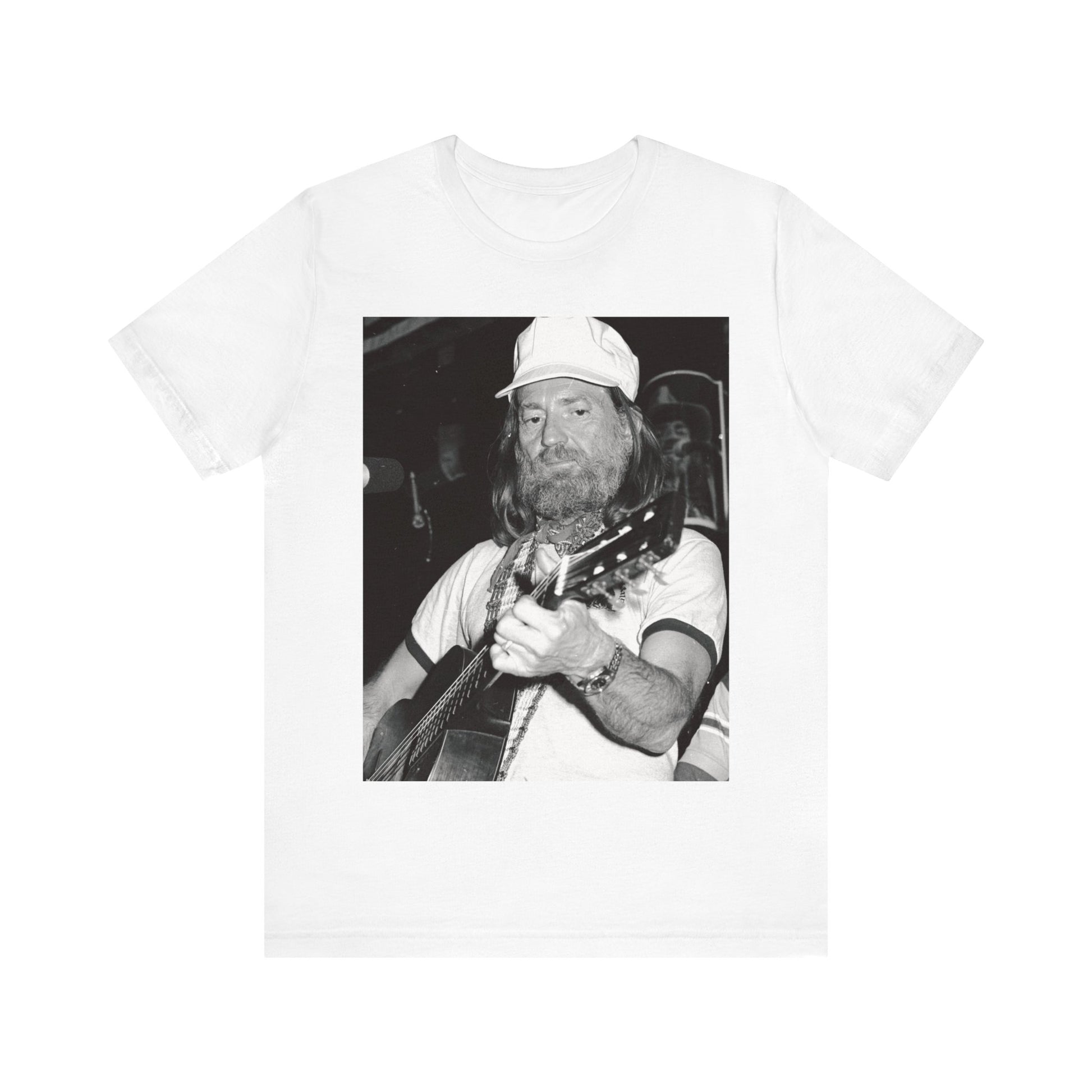 A black graphic t-shirt featuring a 70s cool free spirit graphic of Willie Nelson.