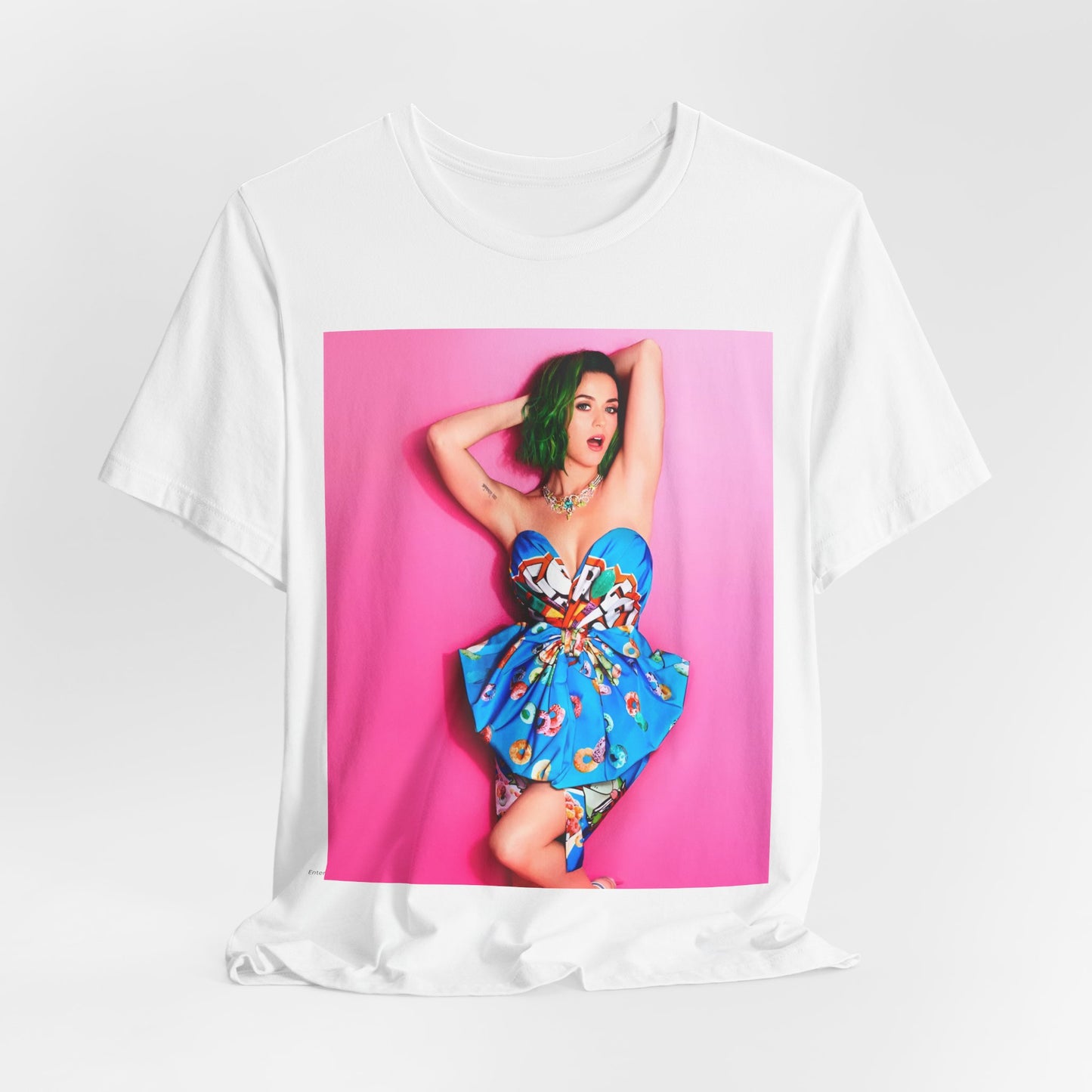 A black graphic t-shirt featuring a graphic related to Katy Perry's 'Dark Horse' song or era.