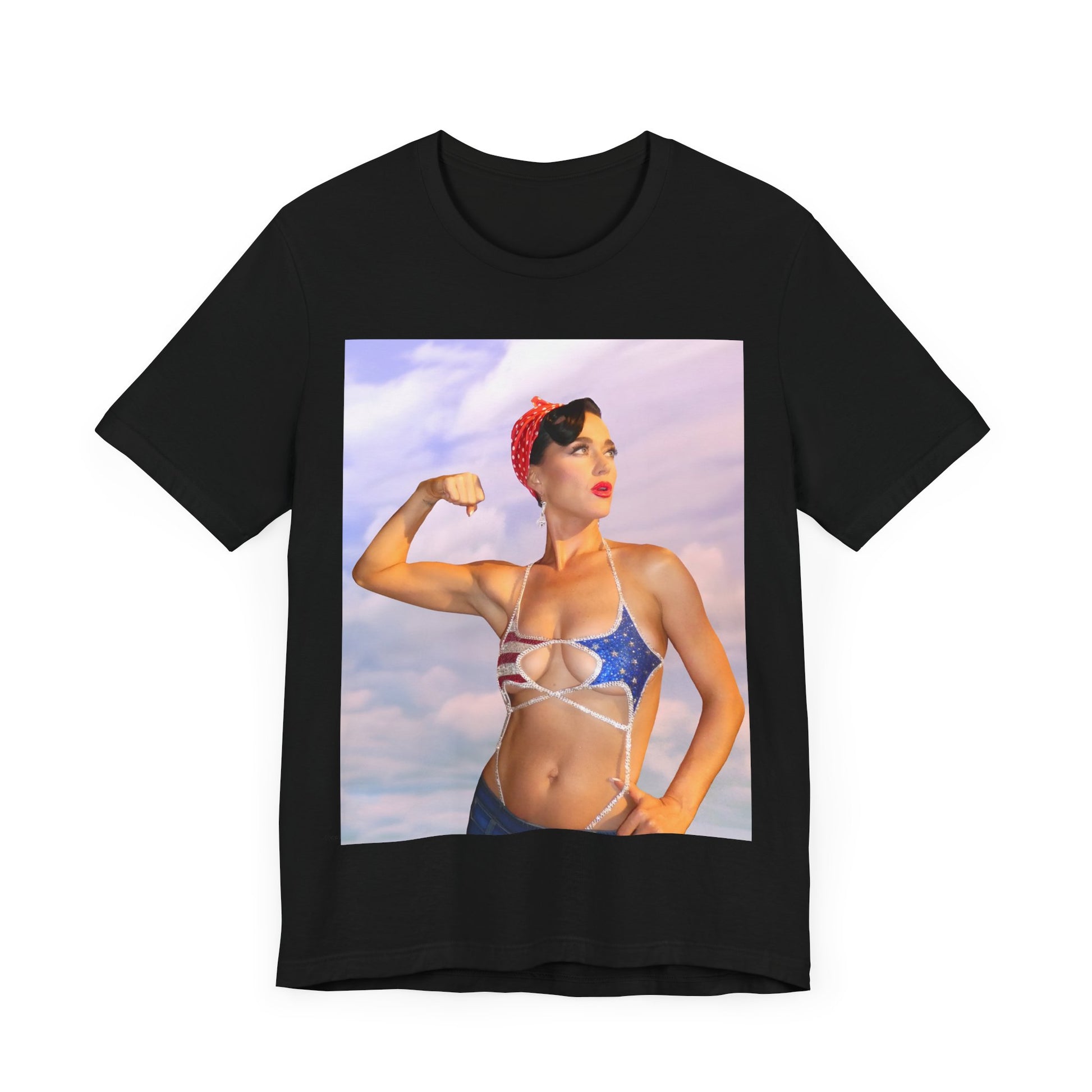 A black graphic t-shirt featuring a bold graphic of Katy Perry as a pop superstar.