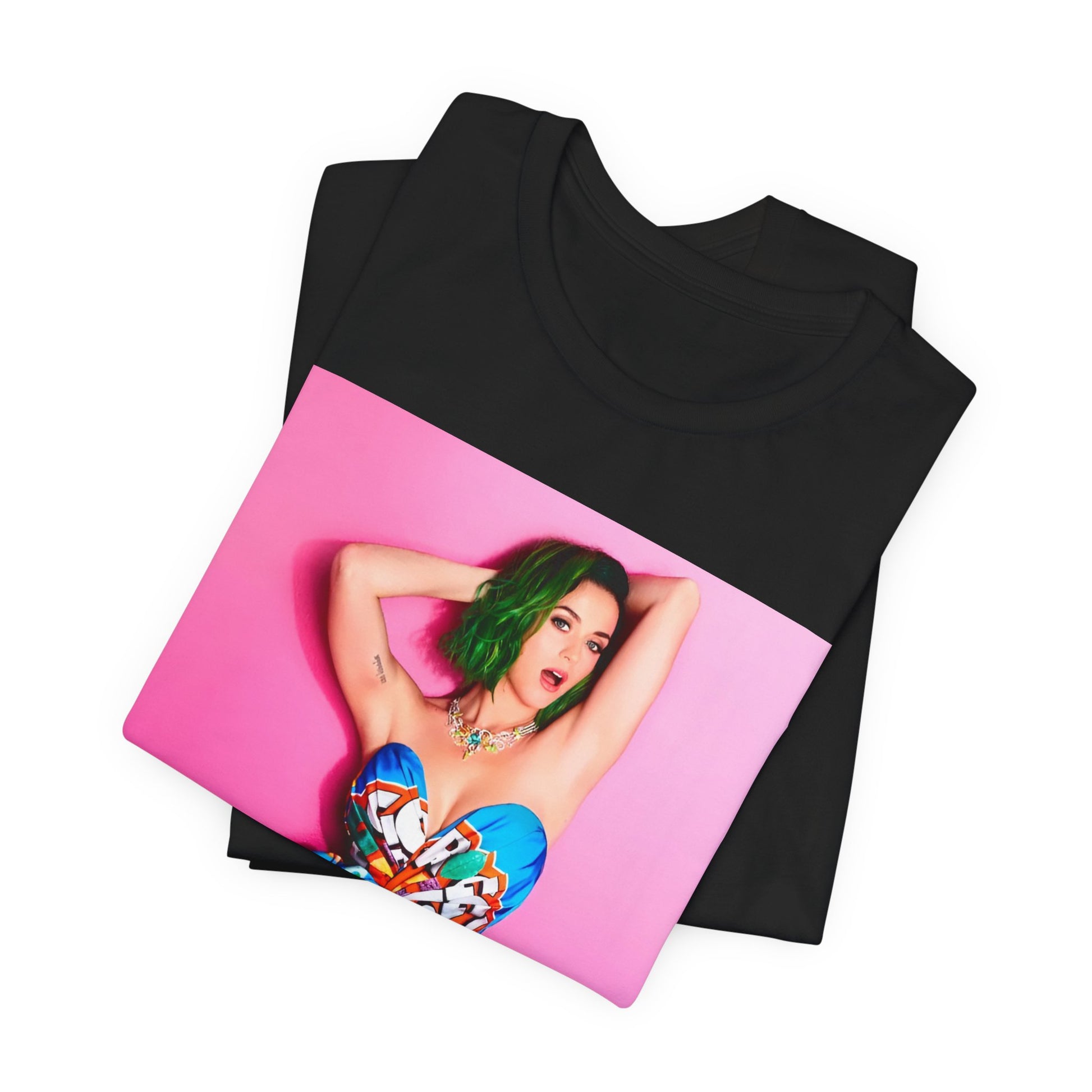 A black graphic t-shirt featuring a graphic related to Katy Perry's 'Dark Horse' song or era.