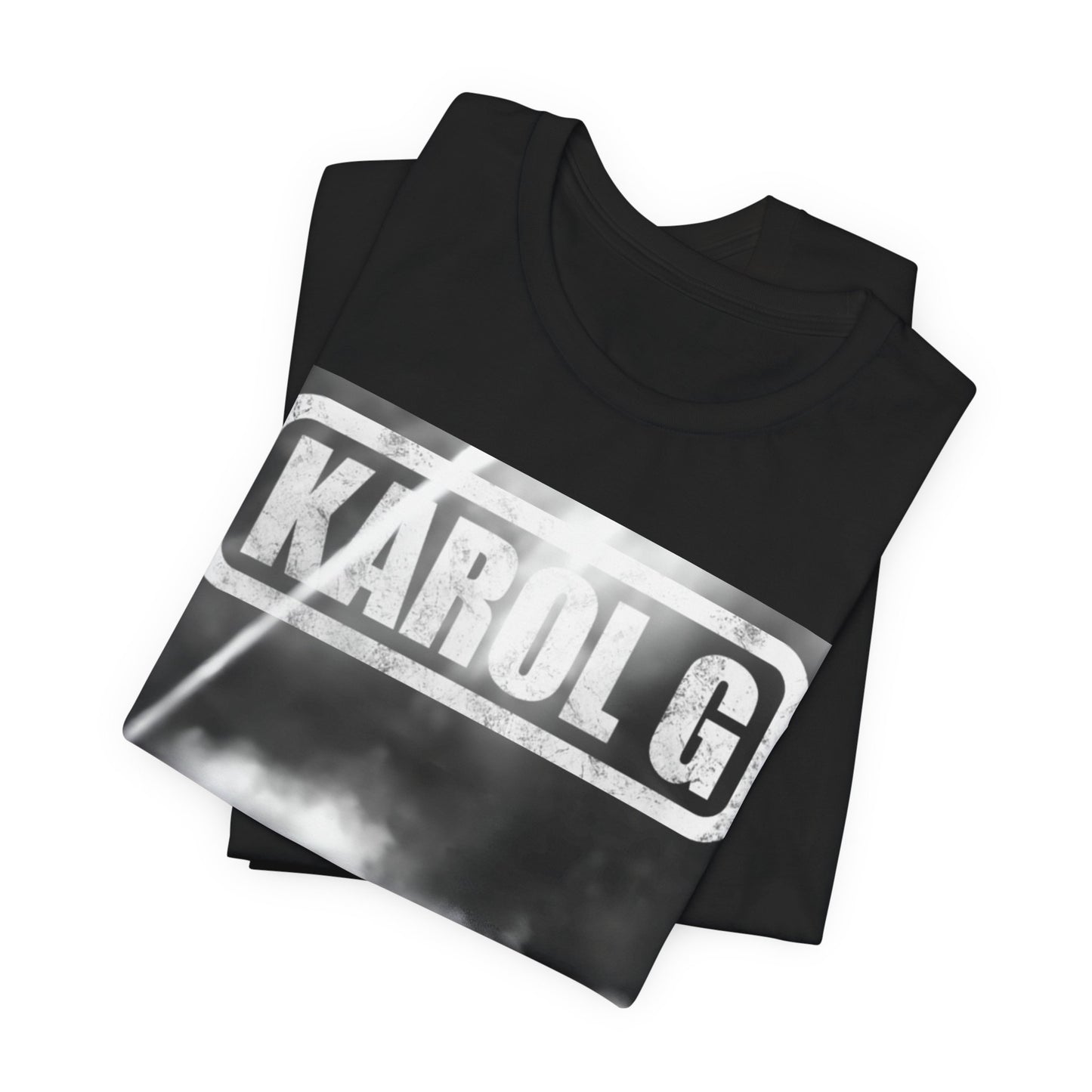 A black graphic t-shirt featuring a black and white graphic or photo of Karol G performing live on stage.
