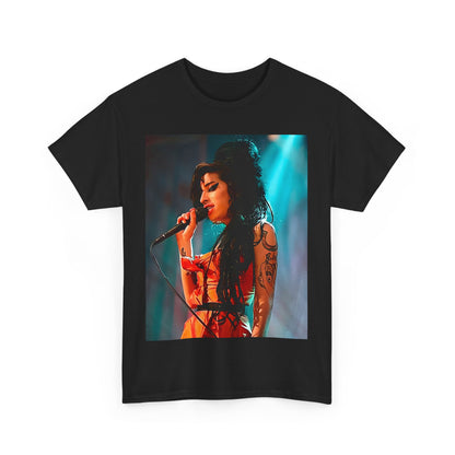 A black graphic t-shirt featuring a photo of Amy Winehouse performing live on stage in 2007, with her signature beehive and expressive singing.