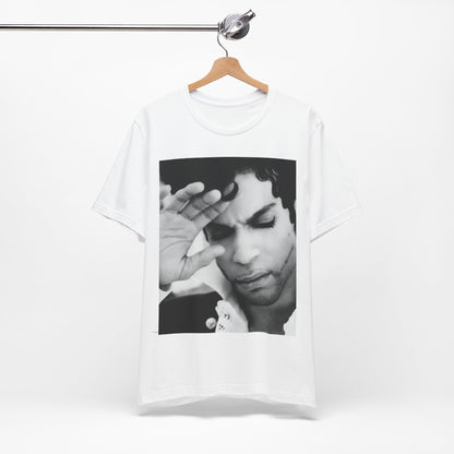 A black graphic t-shirt featuring a black and white graphic or photo portrait of Prince.