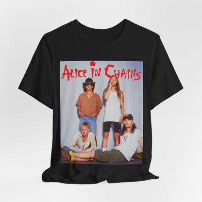 A black graphic t-shirt featuring a band graphic of Alice In Chains from 1990, capturing their early grunge aesthetic.