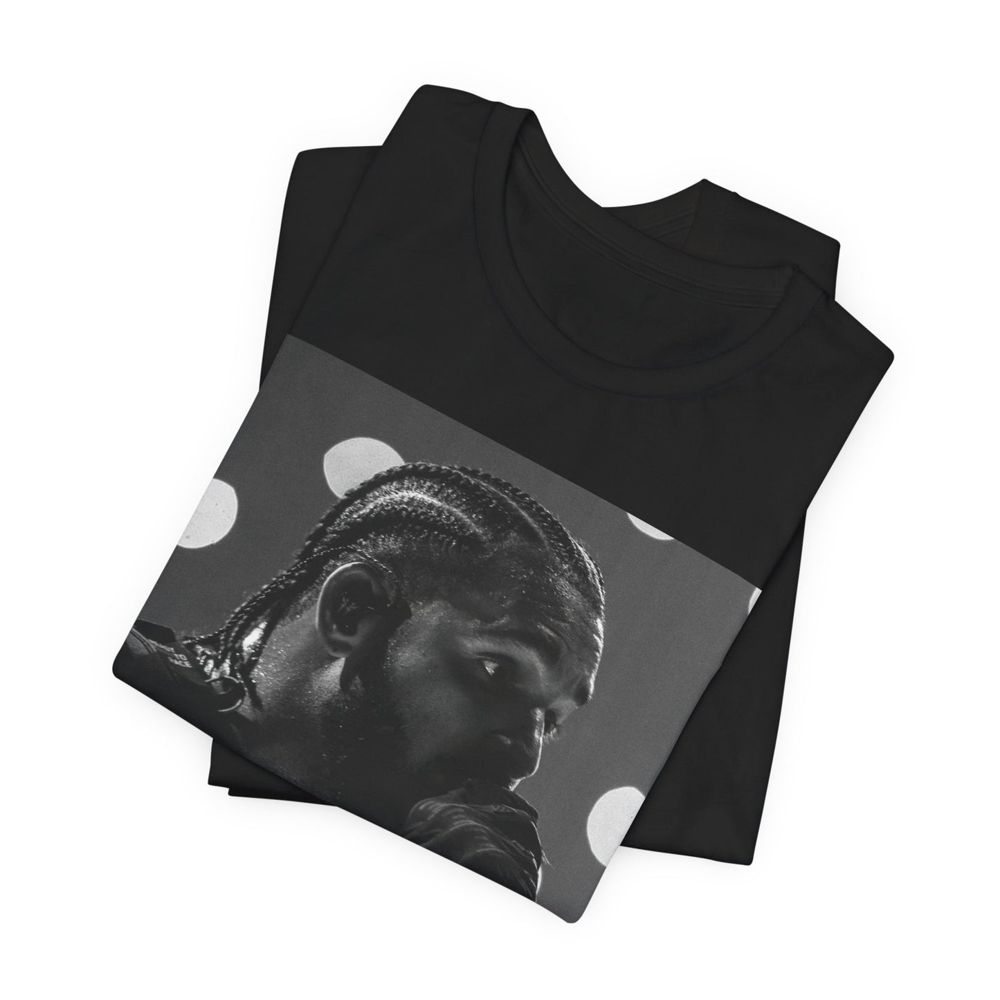 A black graphic t-shirt featuring a classic black and white style graphic of Drake.
