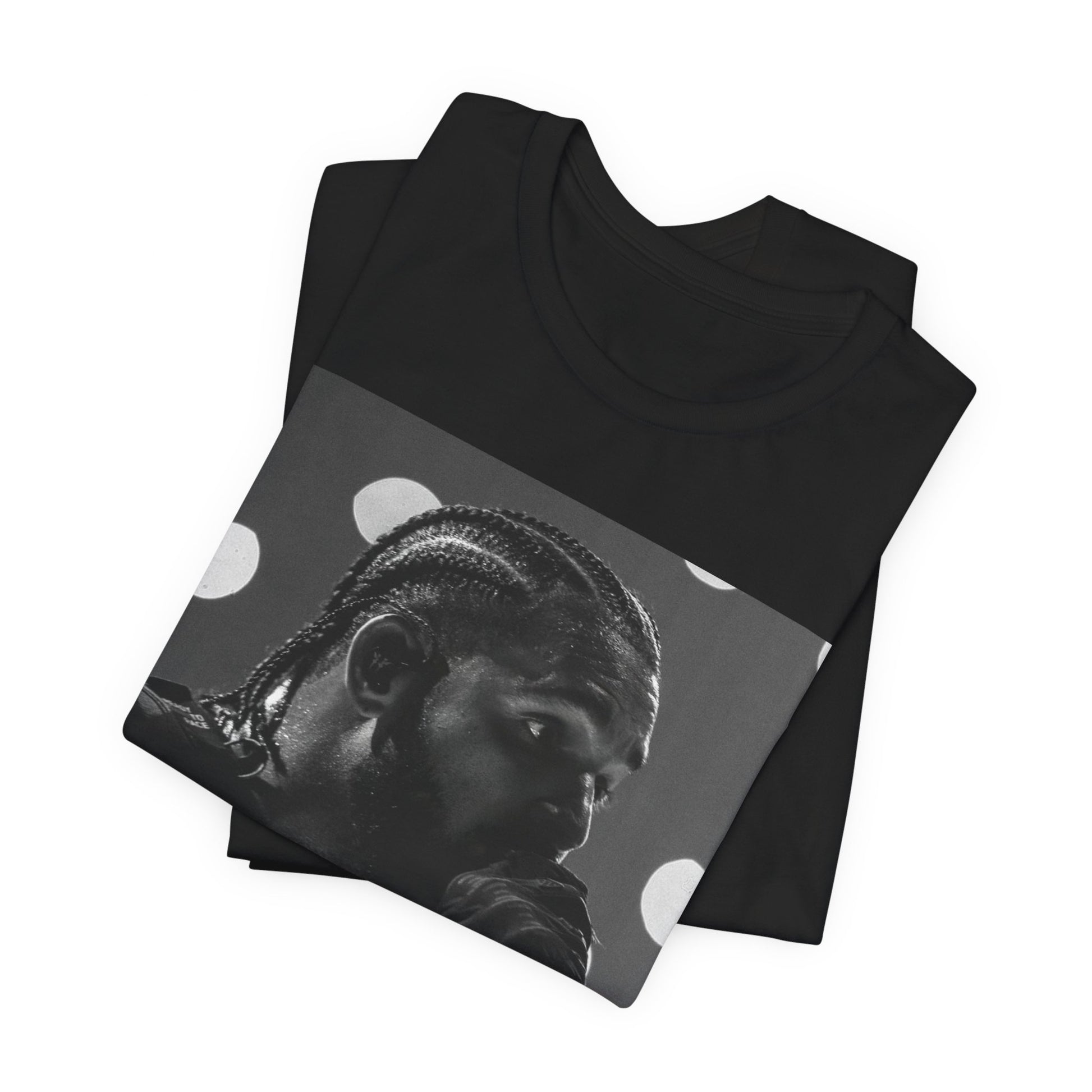 A black graphic t-shirt featuring a classic black and white style graphic of Drake.