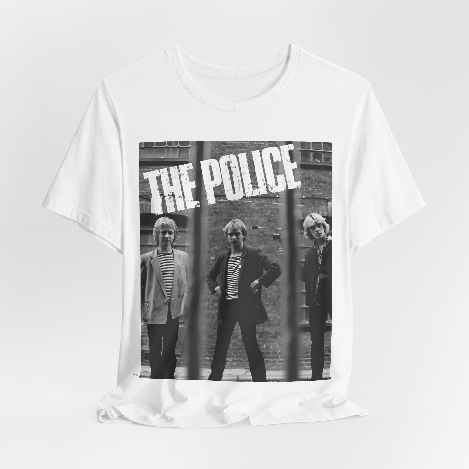 A black graphic t-shirt featuring a vintage new wave icon graphic of The Police.