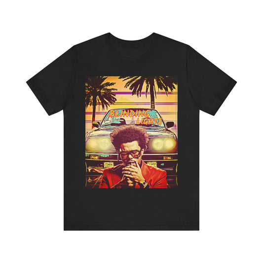 A black graphic t-shirt featuring a graphic related to The Weeknd's 'Blinding Lights' song.
