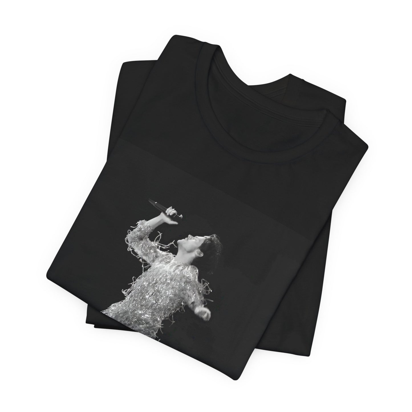 A black graphic t-shirt featuring a boxy pop aesthetic graphic of Harry Styles.