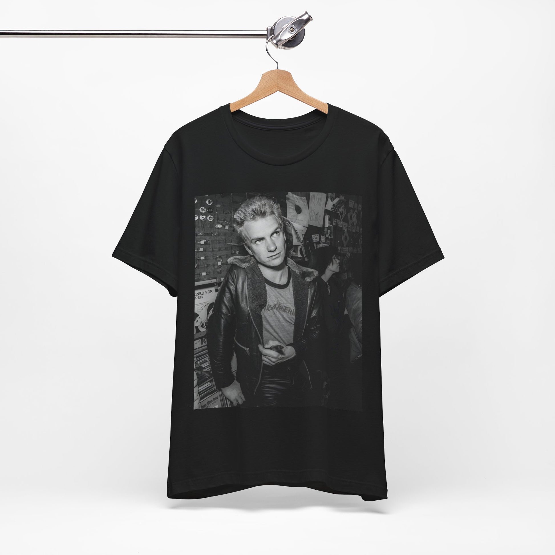 A black graphic t-shirt featuring a vintage black and white monochrome graphic or photo of Sting.