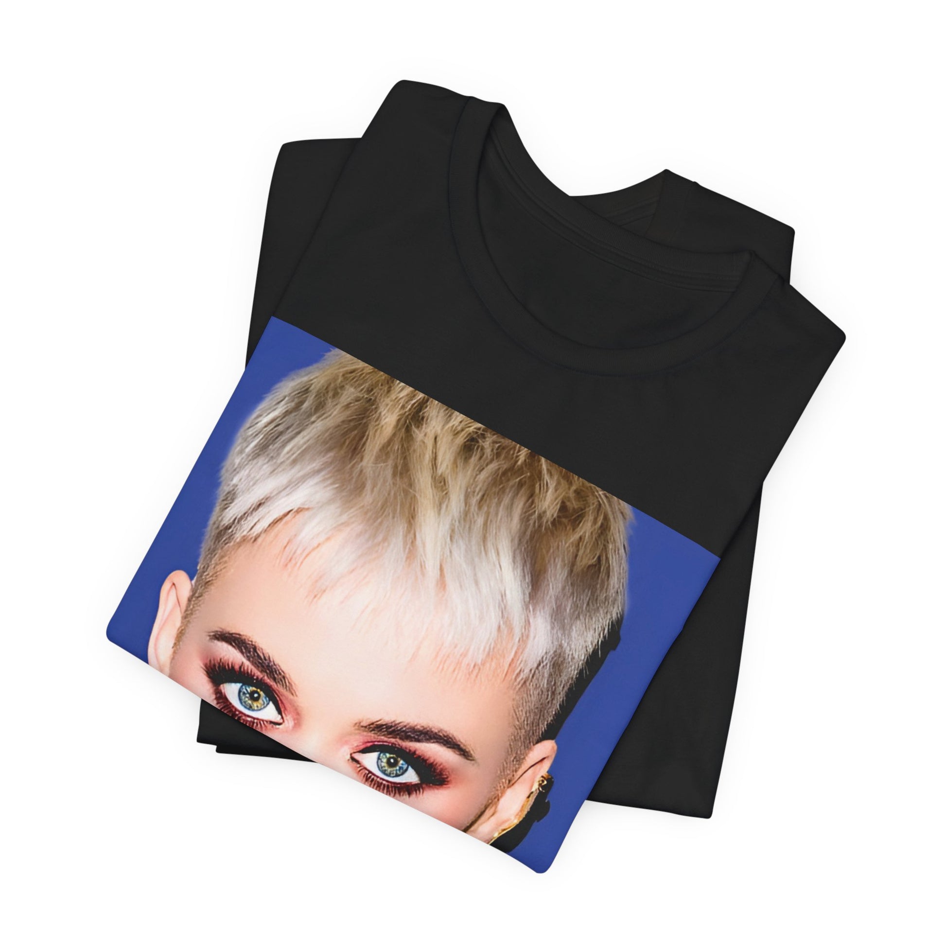 A black graphic t-shirt featuring a graphic of Katy Perry as a global pop phenomenon.