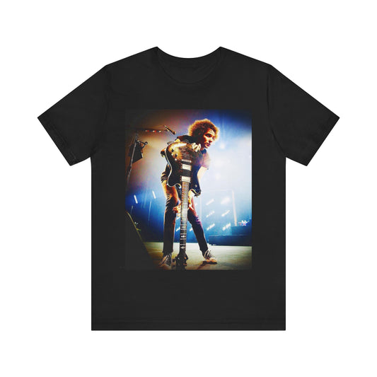 A black graphic t-shirt featuring a concert graphic for Alice In Chains' 2019 live show, with modern band imagery.