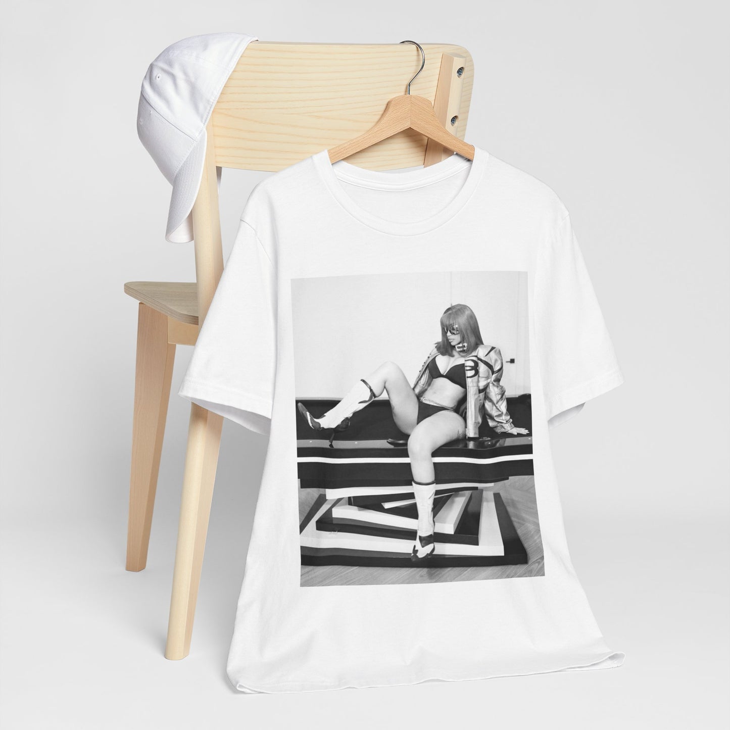 A black graphic t-shirt featuring an artistic or aesthetic graphic of Cardi B in a hip hop style.