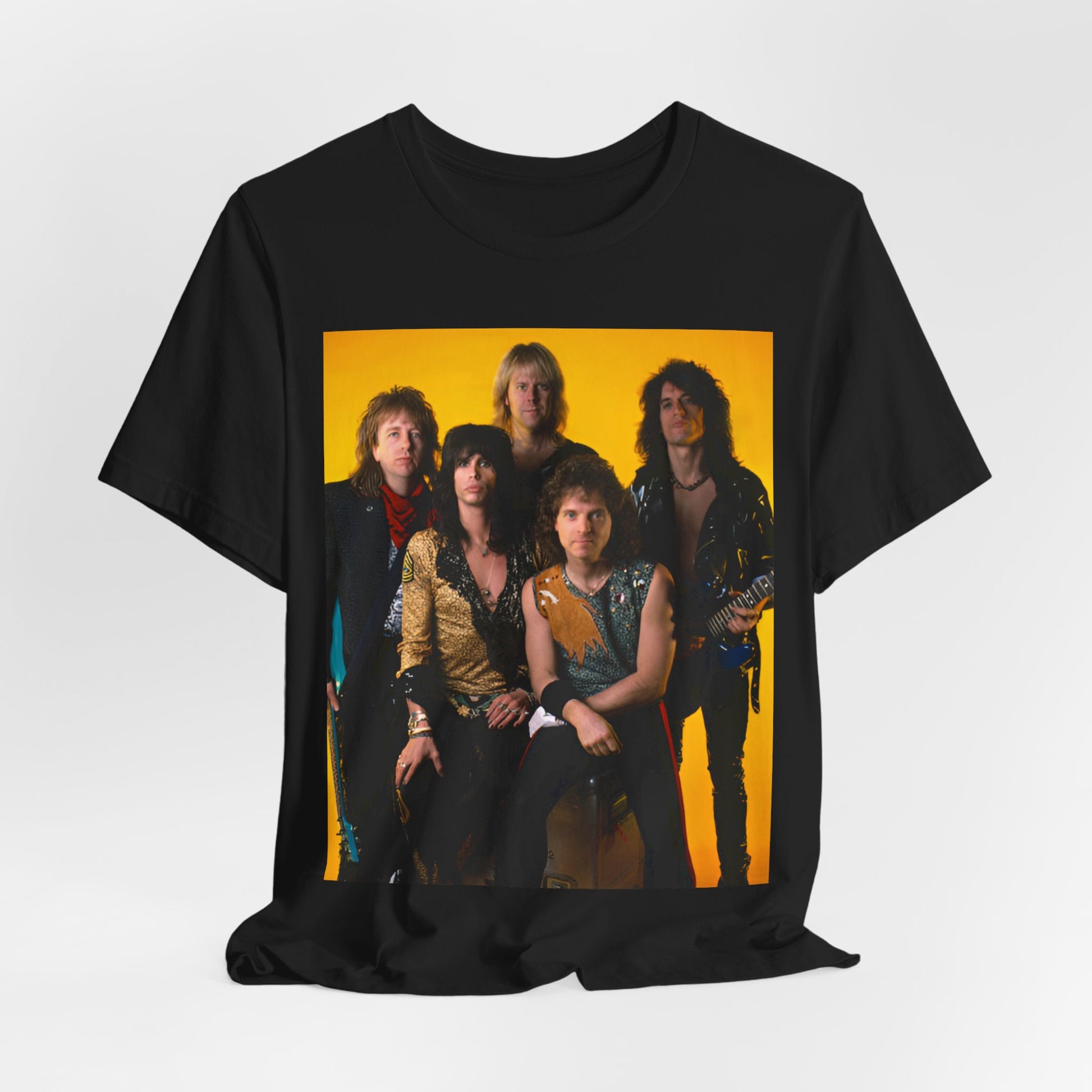 A black graphic t-shirt featuring a band photo of Aerosmith from the 1980s, showing the members in their iconic styles from that decade.