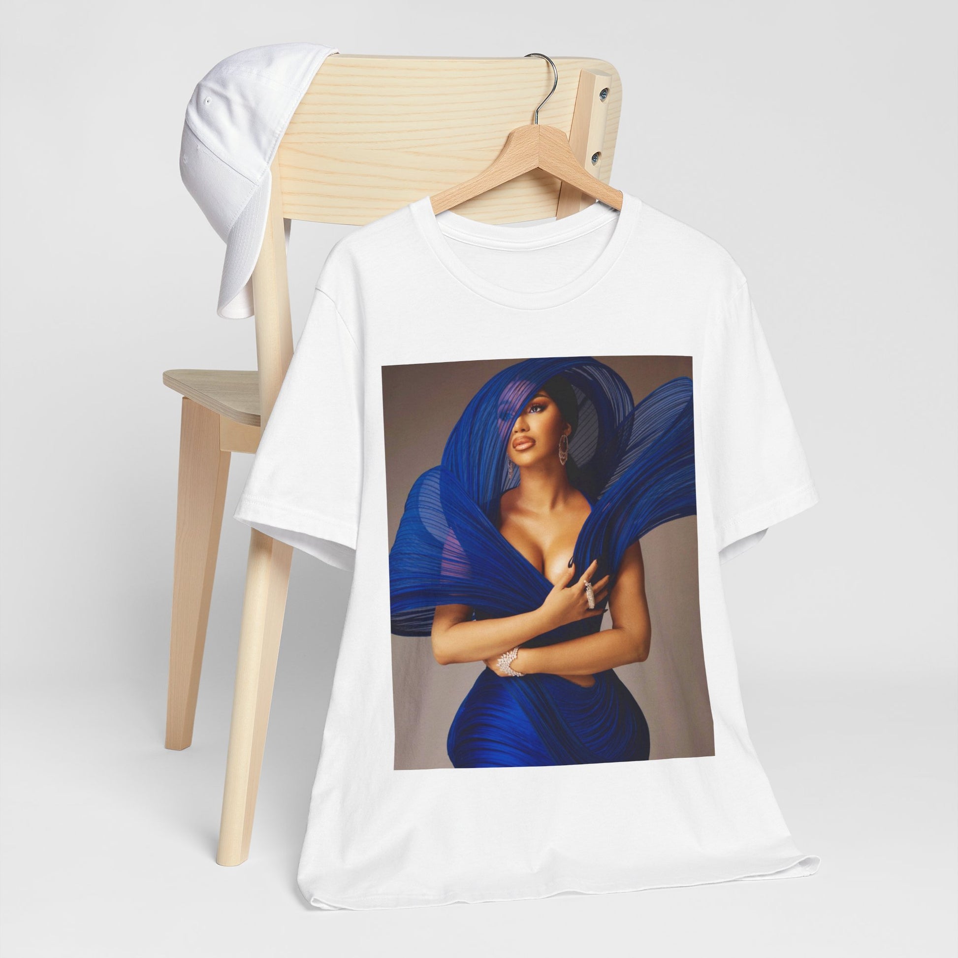 A black graphic t-shirt featuring a graphic of Cardi B in a powerful stance.