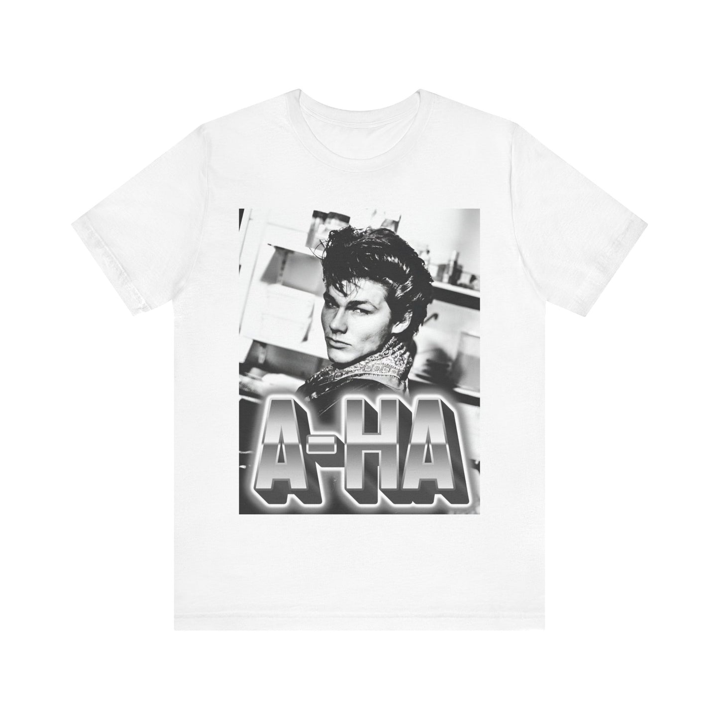 A black graphic t-shirt featuring a retro 1986-style graphic for the band A-HA, possibly with band members in a stylized design.