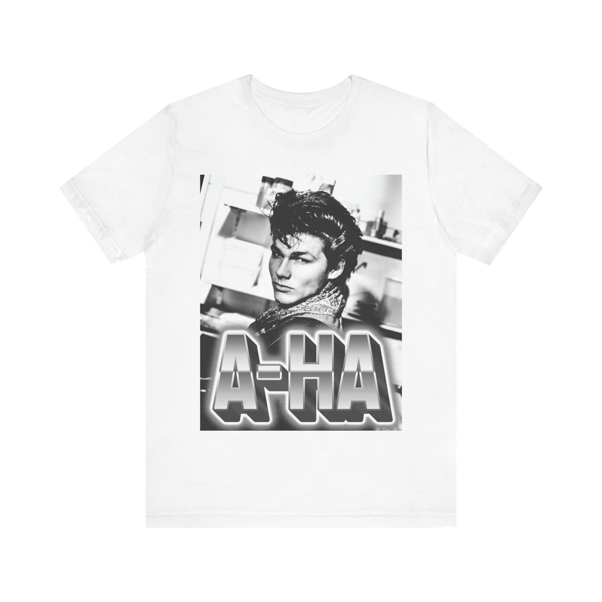 A black graphic t-shirt featuring a retro 1986-style graphic for the band A-HA, possibly with band members in a stylized design.