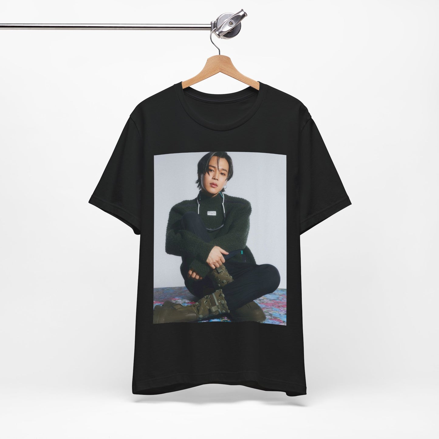 A black graphic t-shirt featuring a modern K-Pop essential graphic of Jimin.