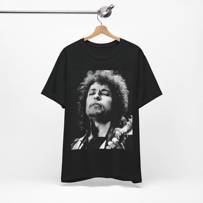 A black graphic t-shirt featuring a retro black and white graphic or photo of Bob Dylan performing live.