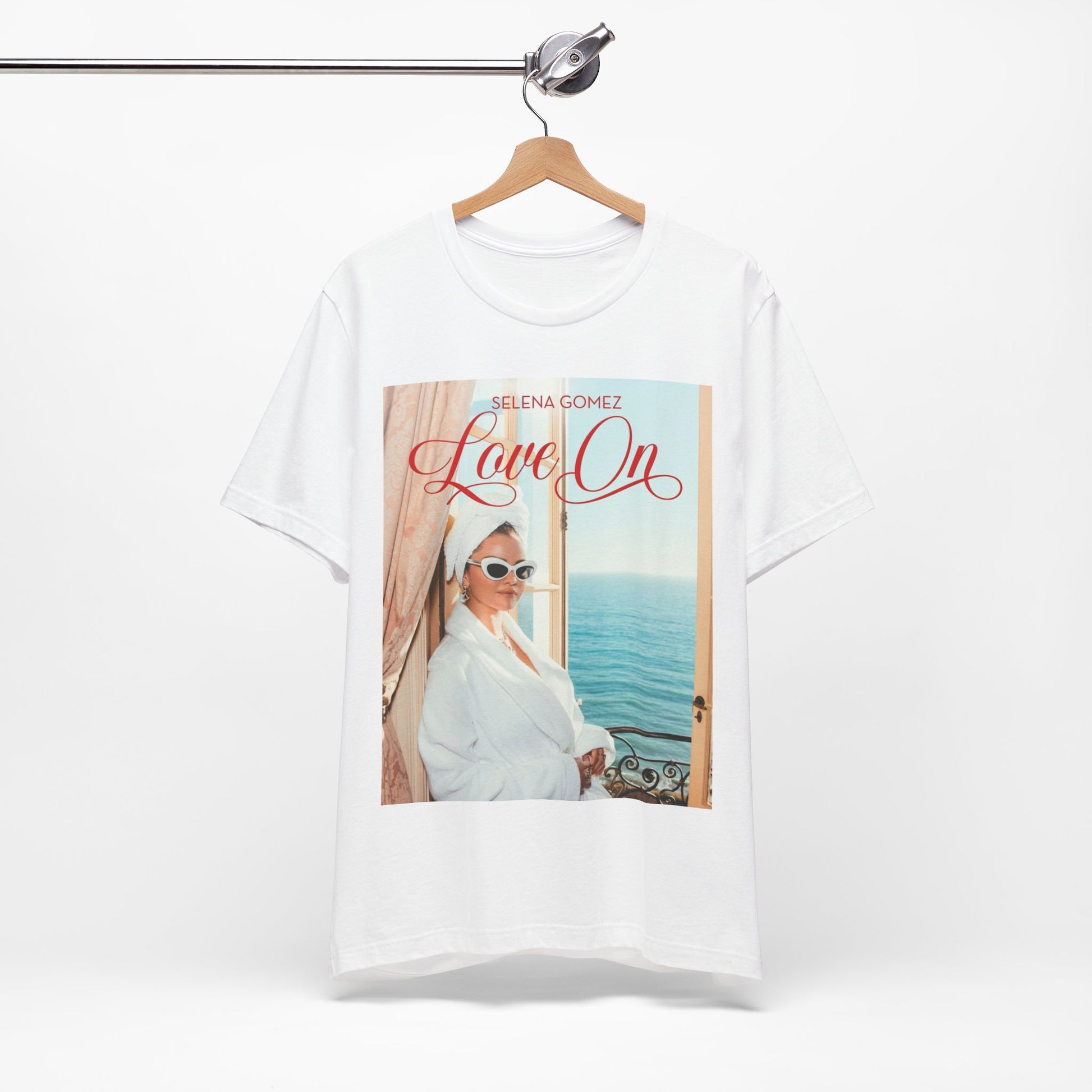 A black graphic t-shirt featuring a graphic related to Selena Gomez's 'Love On' song.