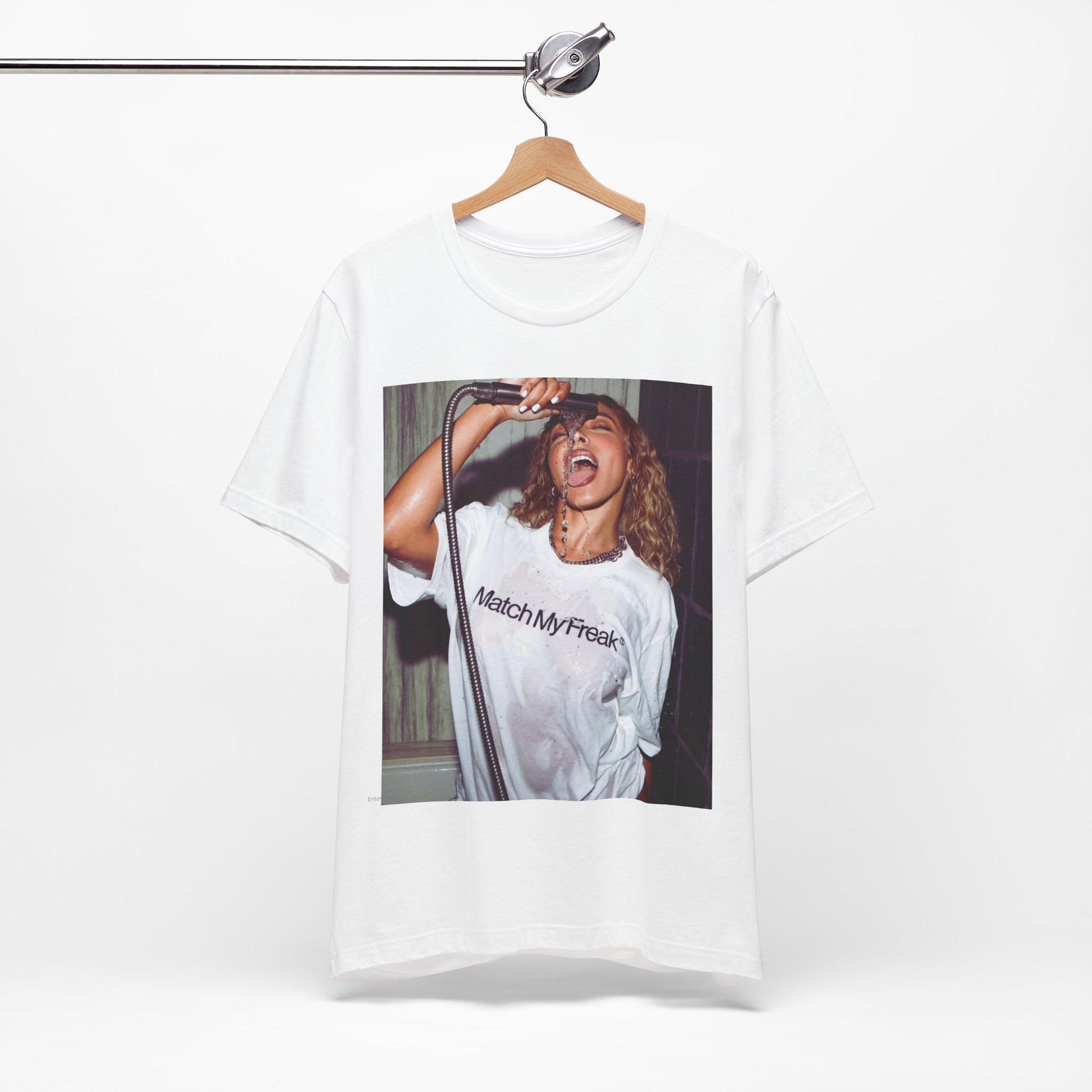 A black graphic t-shirt featuring an aesthetic graphic of Tinashe with a 'Nasty' vibe.