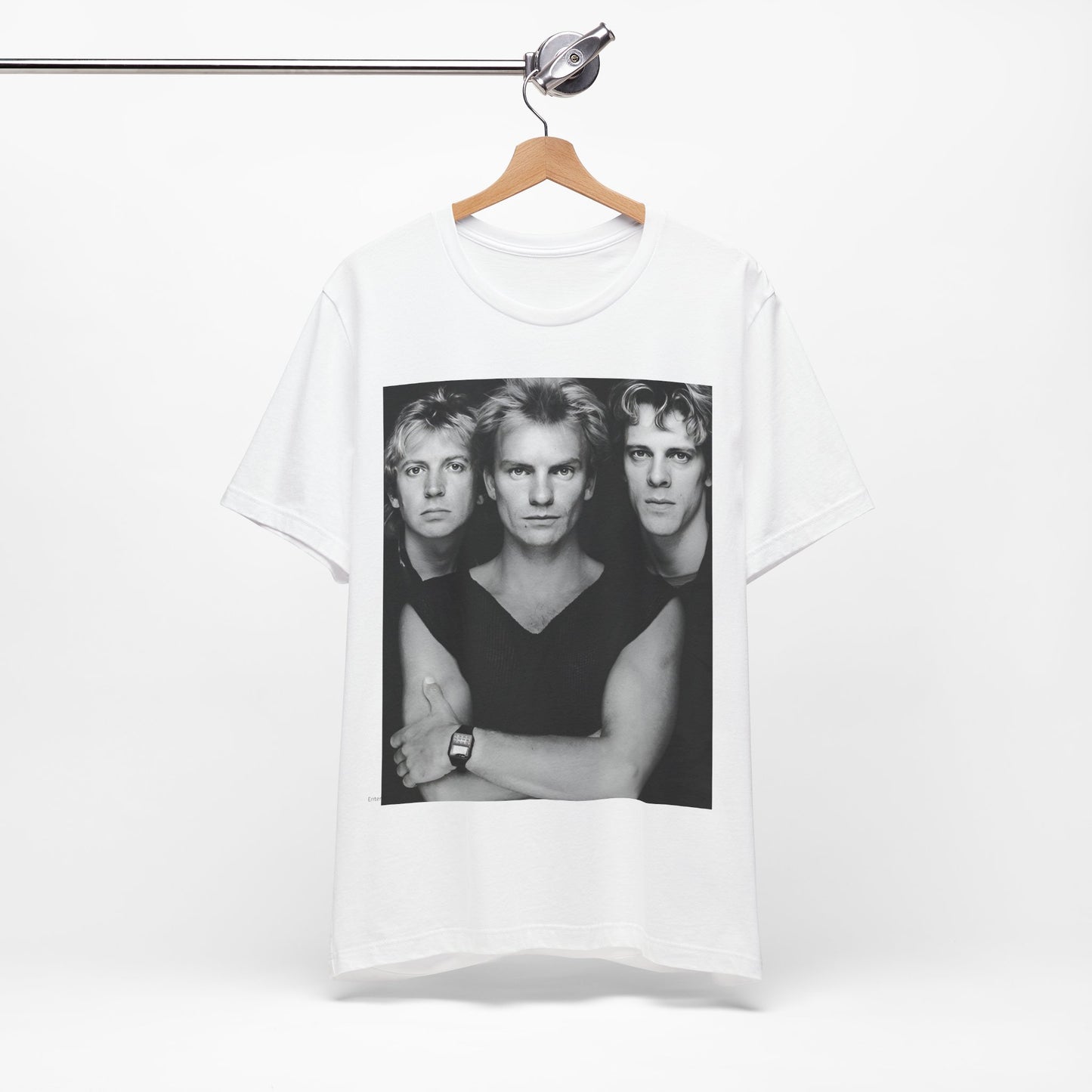 A black graphic t-shirt featuring a graphic related to The Police's 'Every Breath You Take' song or era.