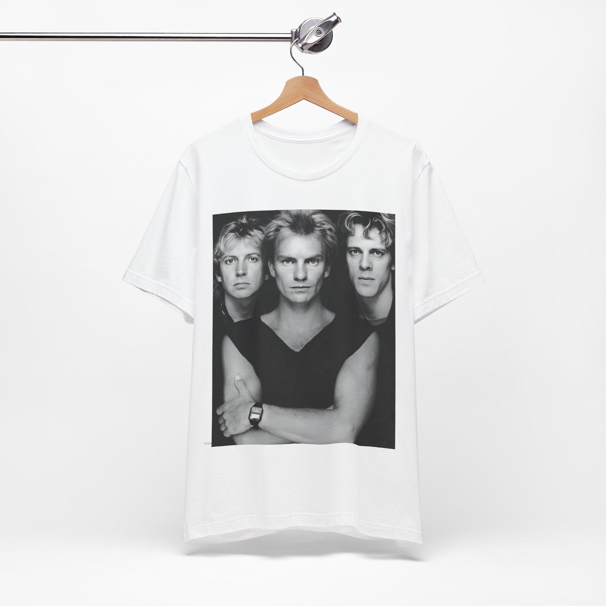 A black graphic t-shirt featuring a graphic related to The Police's 'Every Breath You Take' song or era.