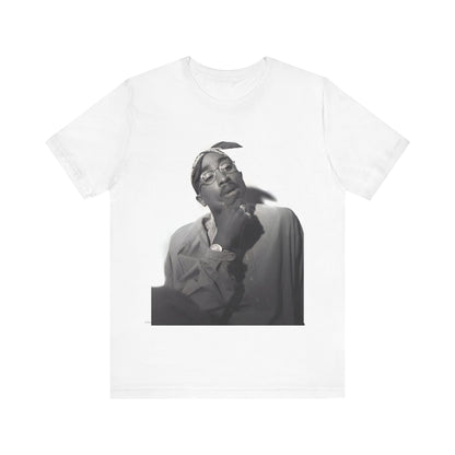A black graphic t-shirt featuring a classic 90s West Coast rap graphic of Tupac.