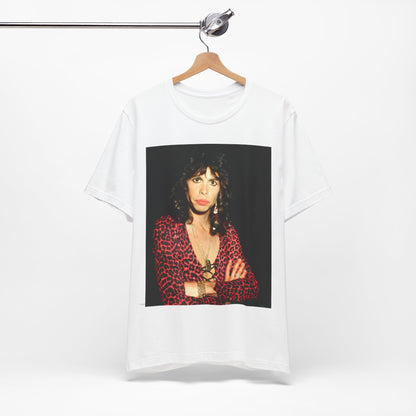 A black graphic t-shirt featuring a vintage 70s-inspired design with Aerosmith branding, incorporating a prominent leopard print pattern.