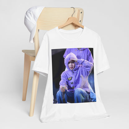 A black graphic t-shirt featuring an authentic live performance graphic of Jimin.