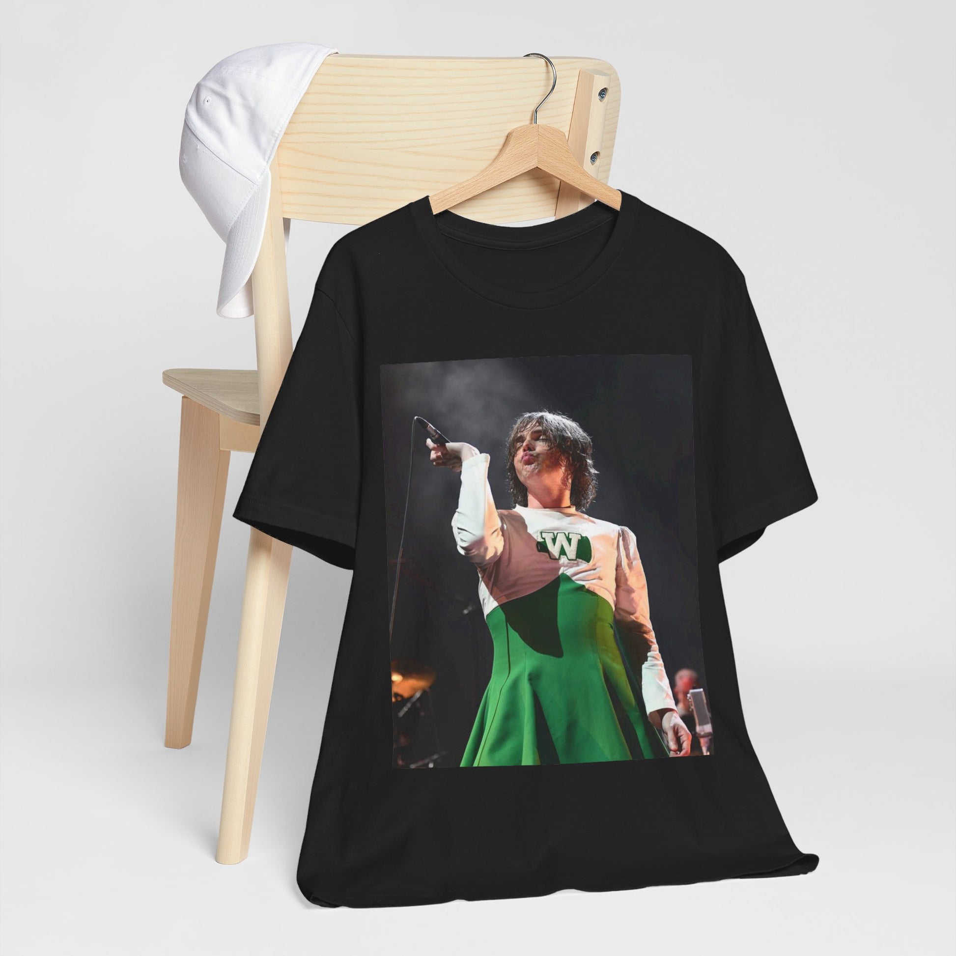 A black graphic t-shirt featuring a photo of My Chemical Romance, possibly with a cheerleader theme.