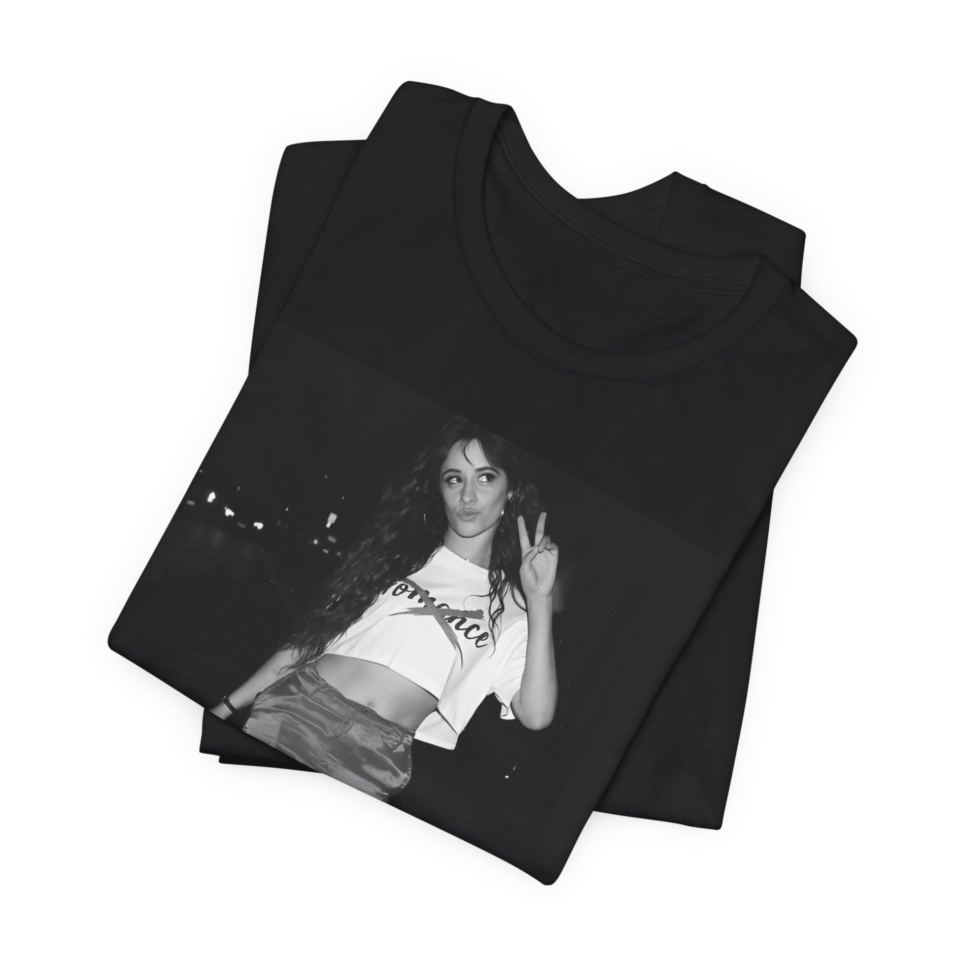 A black graphic t-shirt featuring a photo of Camila Cabello from her "Romance" album era.