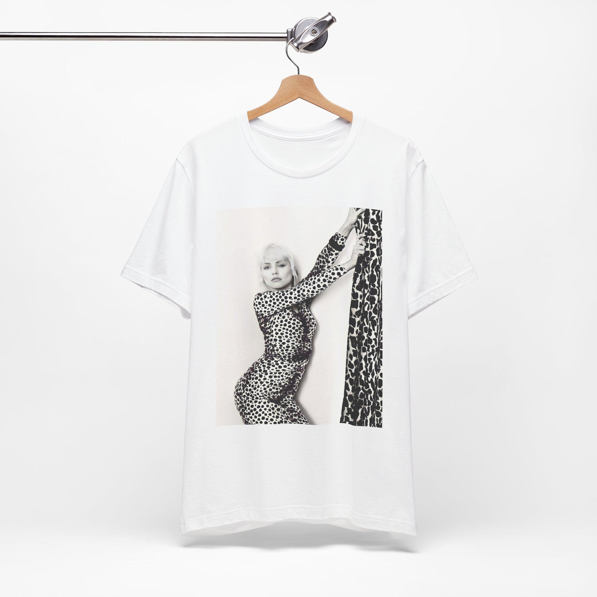 A black graphic t-shirt featuring a black and white, wild-style graphic of Blondie, emphasizing their untamed spirit.