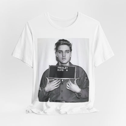 A black graphic t-shirt featuring a retro mugshot photo of Elvis Presley.