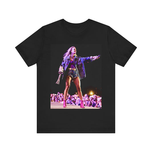 A black graphic t-shirt featuring a graphic of Carrie Underwood with Nashville-themed elements or skyline.