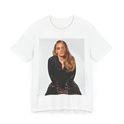 A black graphic t-shirt featuring a portrait of Adele from her iconic blonde era, with her hair styled and her expression poised and elegant.