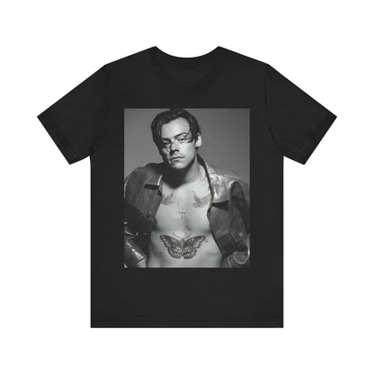 A black graphic t-shirt featuring a black and white portrait photo of Harry Styles.