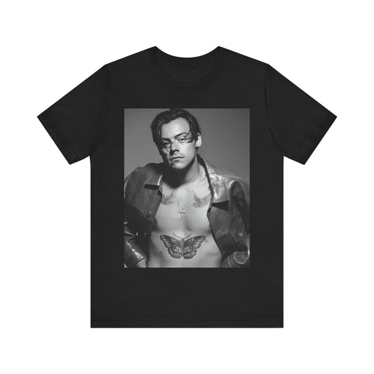 A black graphic t-shirt featuring a black and white portrait photo of Harry Styles.