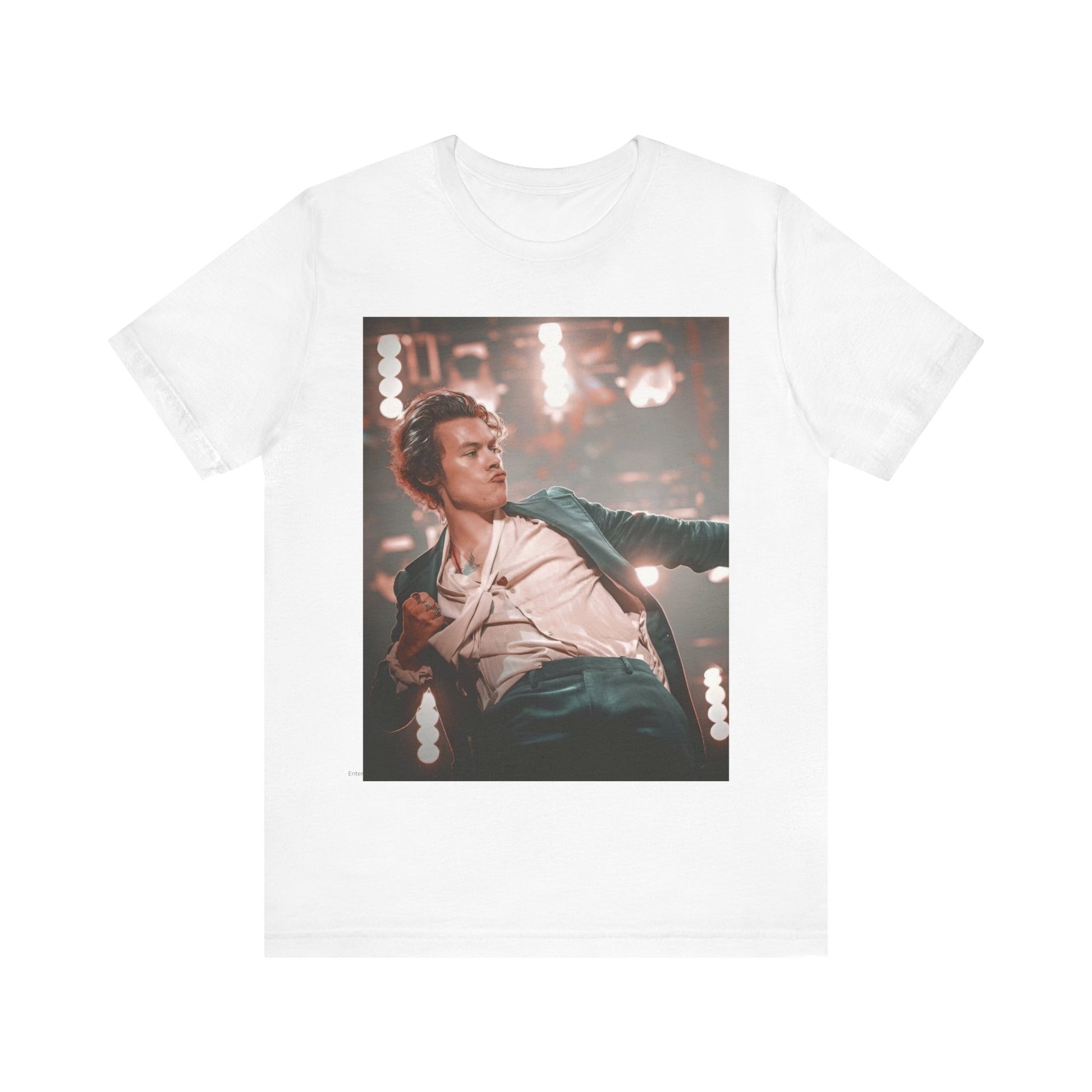 A black graphic t-shirt featuring a graphic or photo of Harry Styles performing live on concert tour.