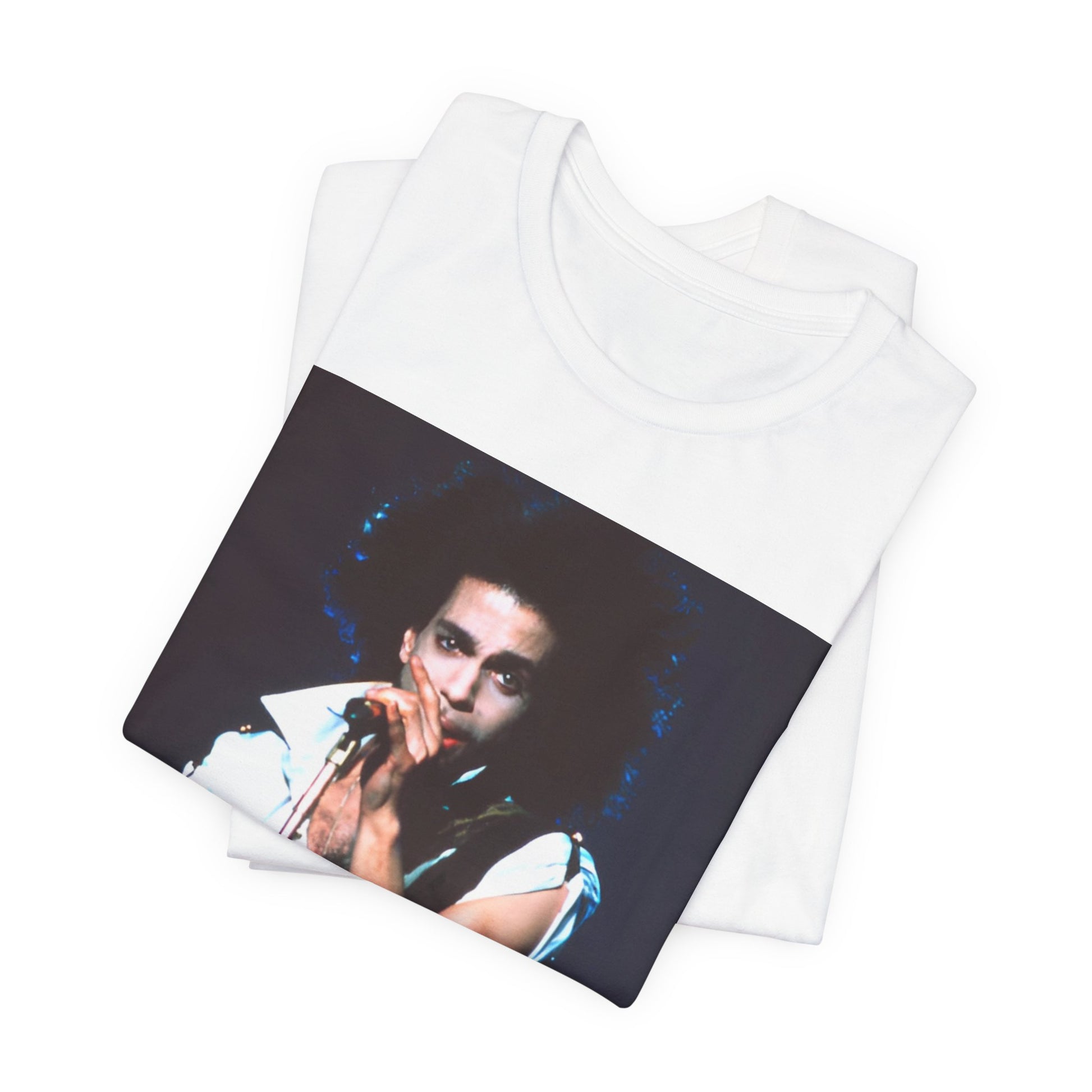 A black graphic t-shirt featuring a 90s live performance graphic of Prince.