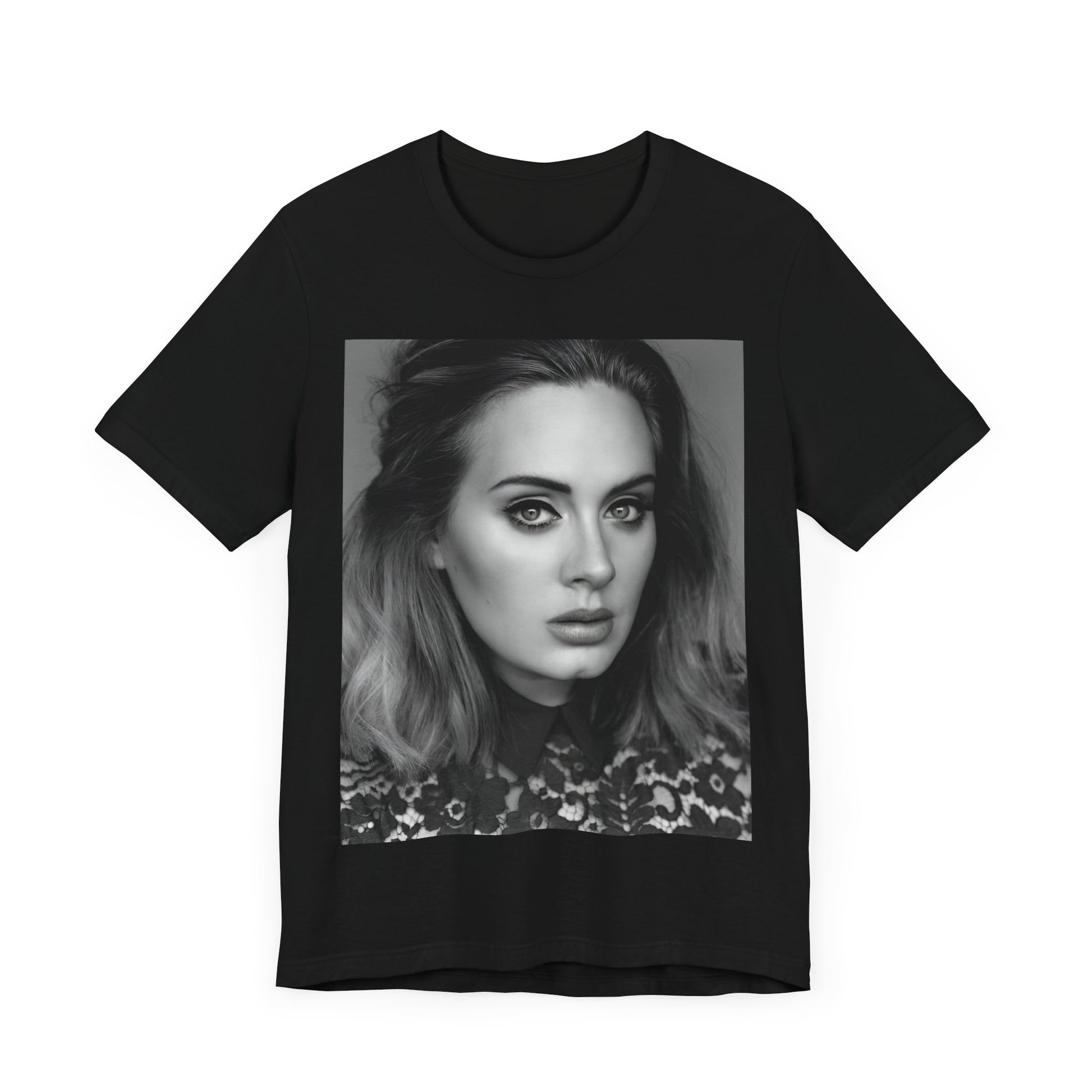 A black graphic t-shirt featuring a classic black and white, monochrome portrait of Adele, showing her with a serene or thoughtful expression.