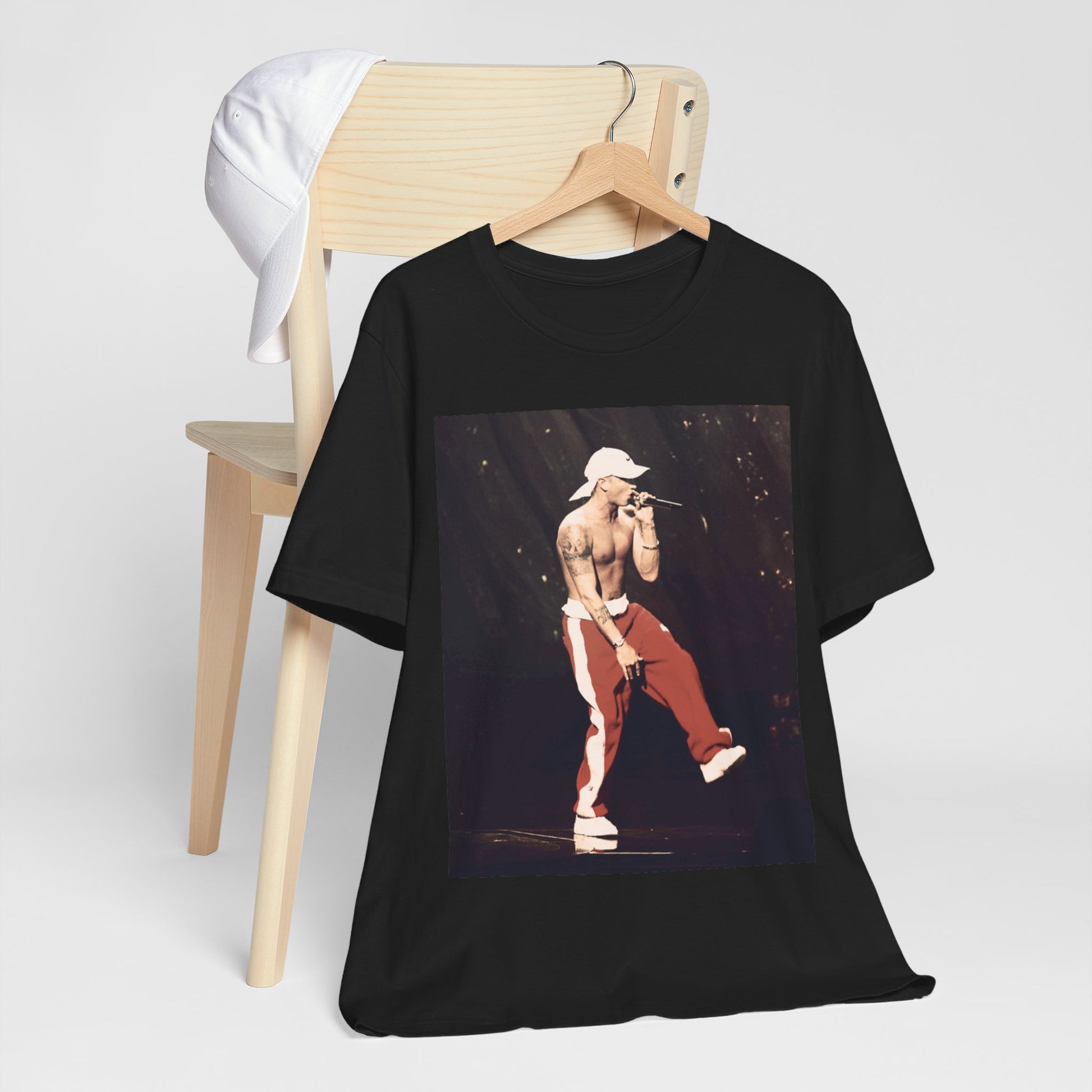 A black graphic t-shirt featuring a graphic inspired by Eminem's film '8 Mile'.
