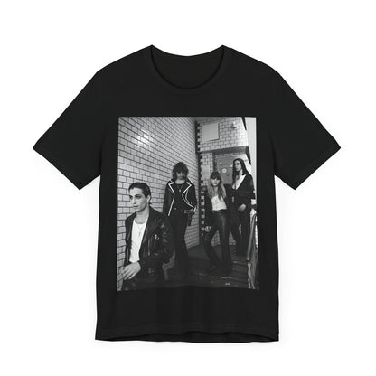 A black graphic t-shirt featuring a black and white graphic or photo of Maneskin in a backstage setting.