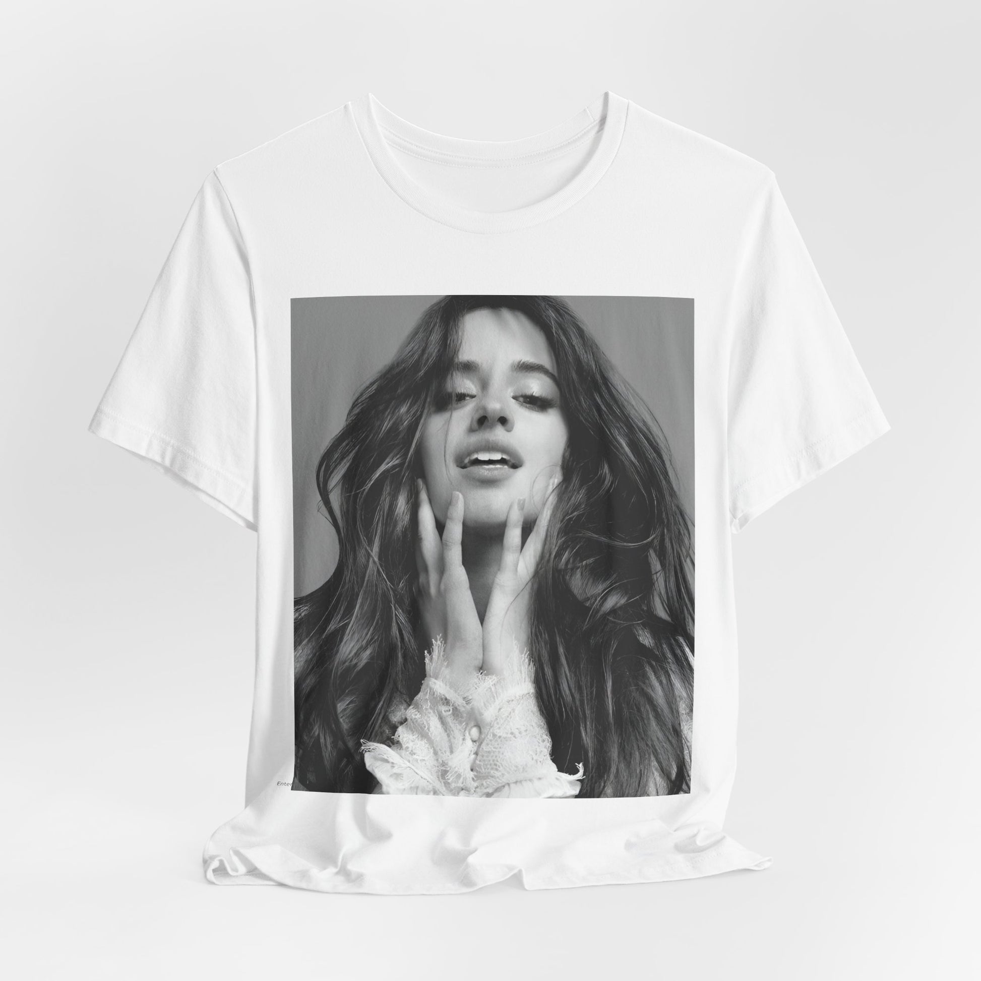 A black graphic t-shirt featuring a black and white portrait photo of Camila Cabello.
