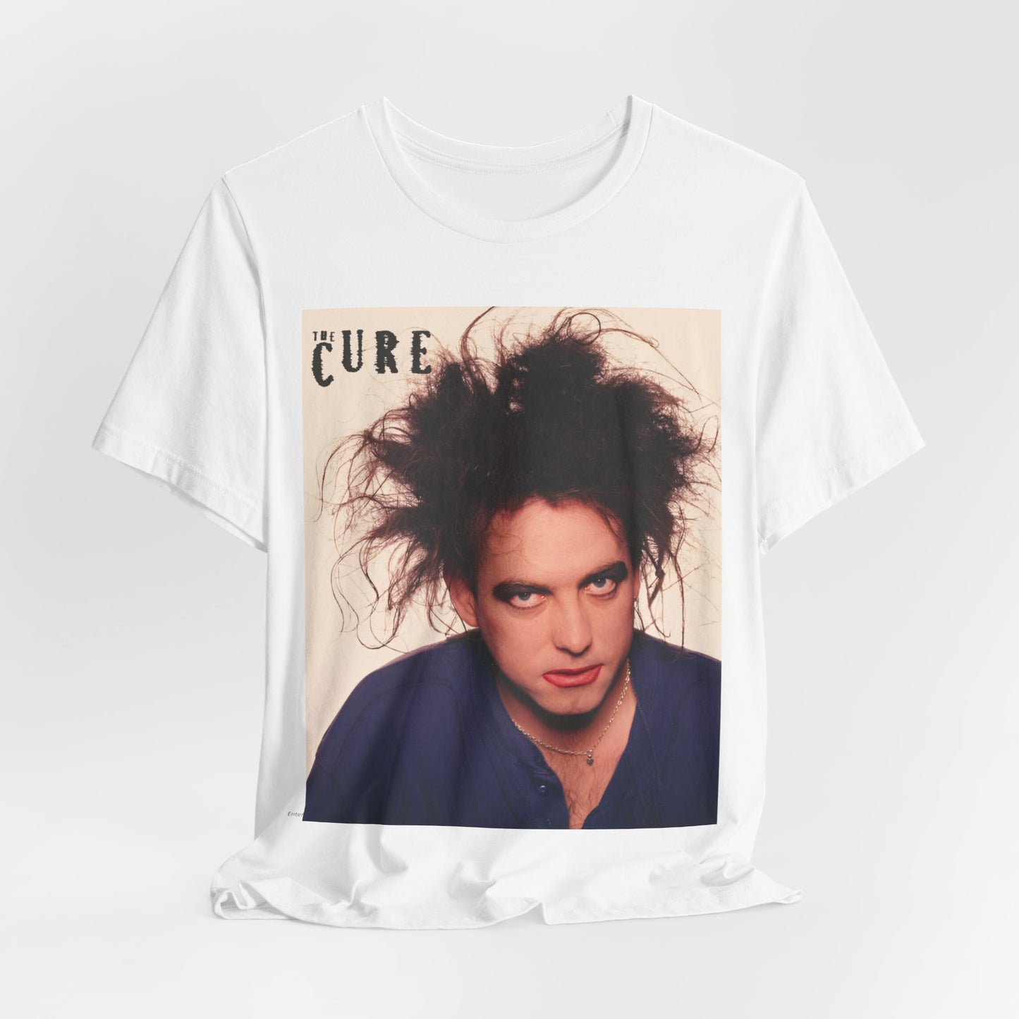 A black graphic t-shirt featuring a photo portrait of Robert Smith from The Cure.