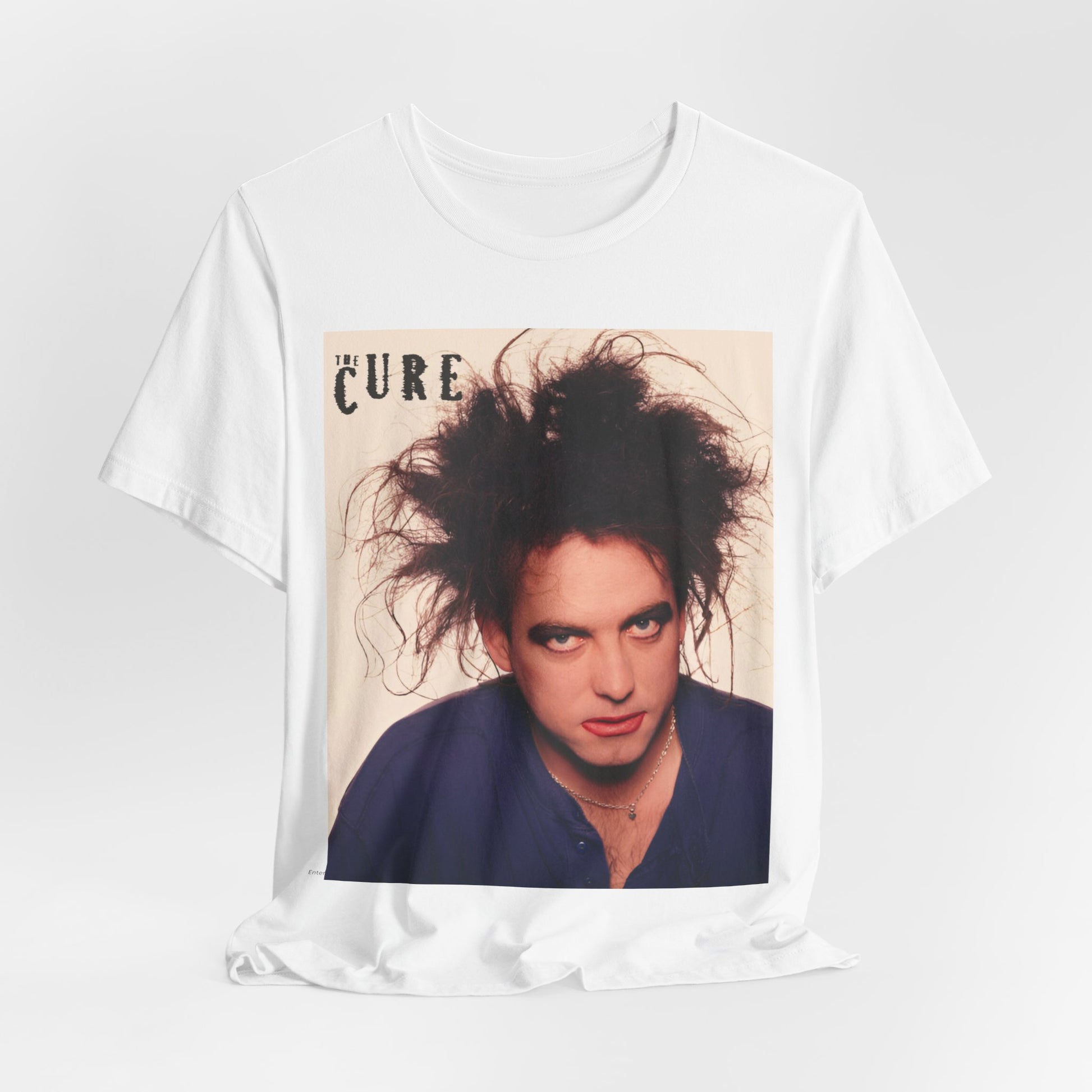 A black graphic t-shirt featuring a photo portrait of Robert Smith from The Cure.