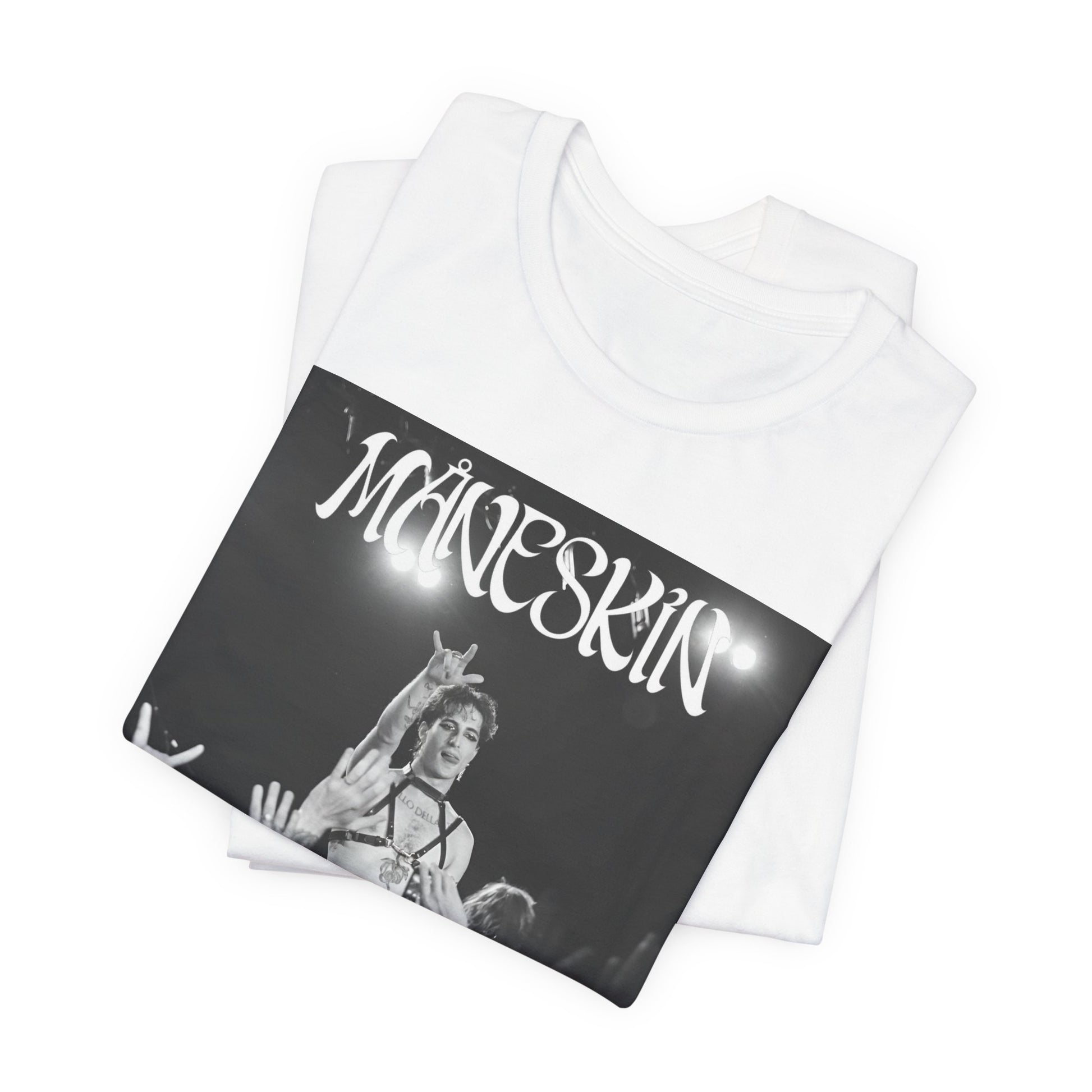 A black graphic t-shirt featuring a graphic or photo of Maneskin performing live.